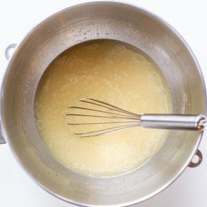 liquid with oil and liquid in a mixing bowl