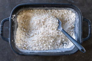 Powdered sugar with walnuts.