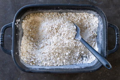 Powdered sugar with walnuts.