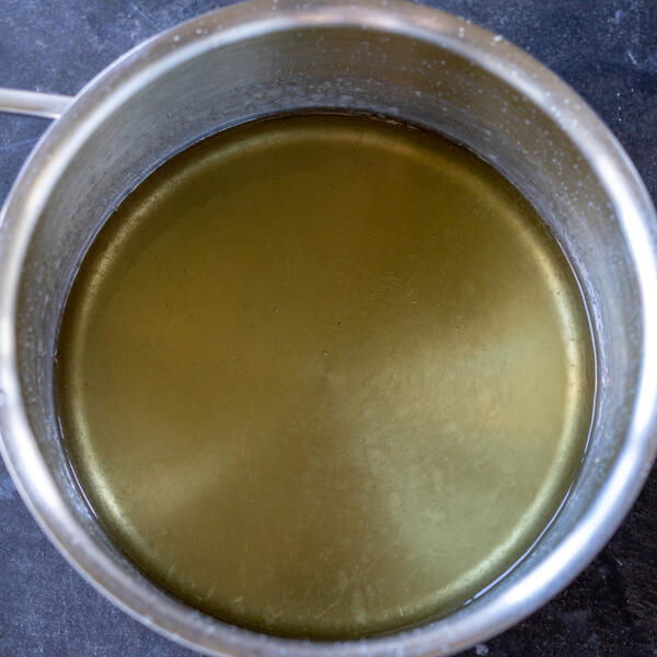 Sugar syrup in a pan.