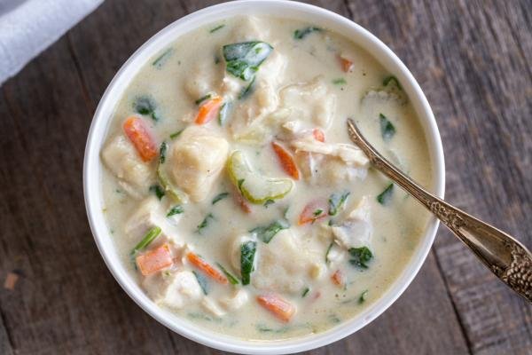 A bowl of chicken gnocchi soup in a bowl