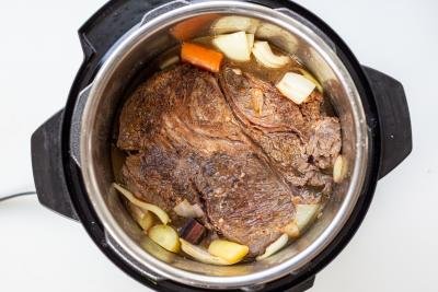 Instant pot with beef and onions