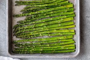 Roasted asparagus on a baking sheet