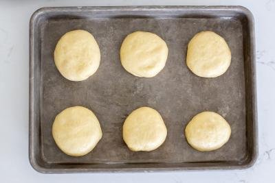 Brioche Buns on a baking sheet