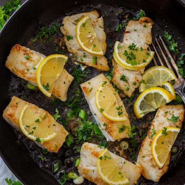 Fried cod with butter herbs and lemon