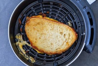 Grilled cheese cooked in an air fryer basket