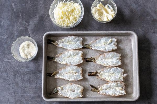 Butterflied shrimp on a baking sheet