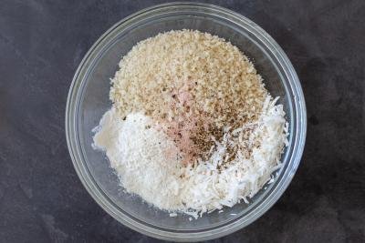 crumbs, coconut and seasoning in a bowl