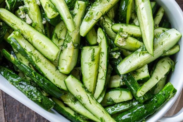 Marinated cucumbers in a serving dish