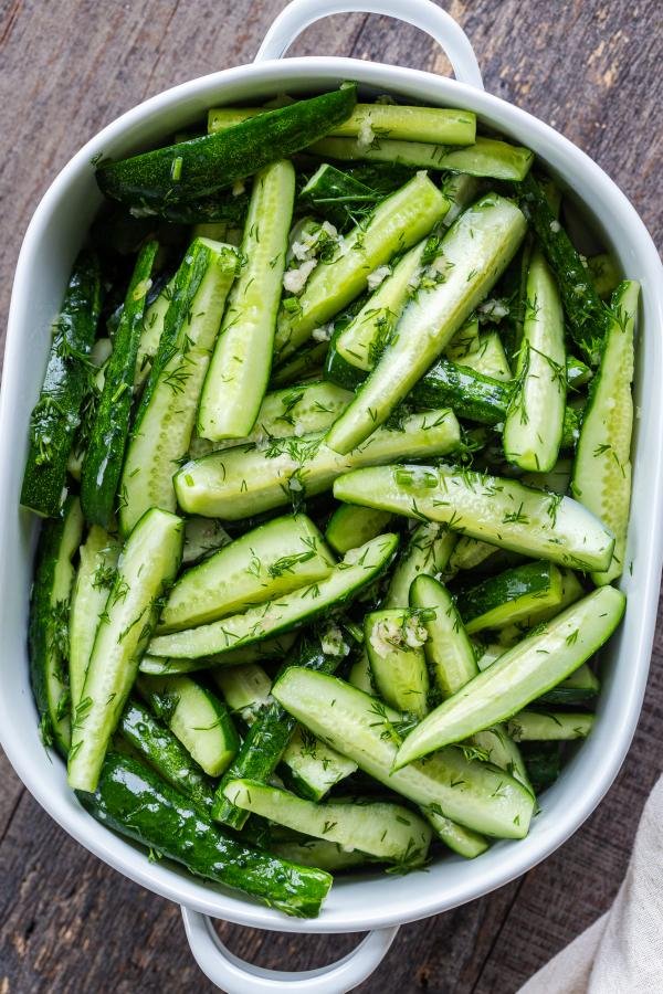 Marinated cucumbers in a serving dish