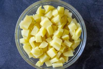cut up potatoes in a bowl