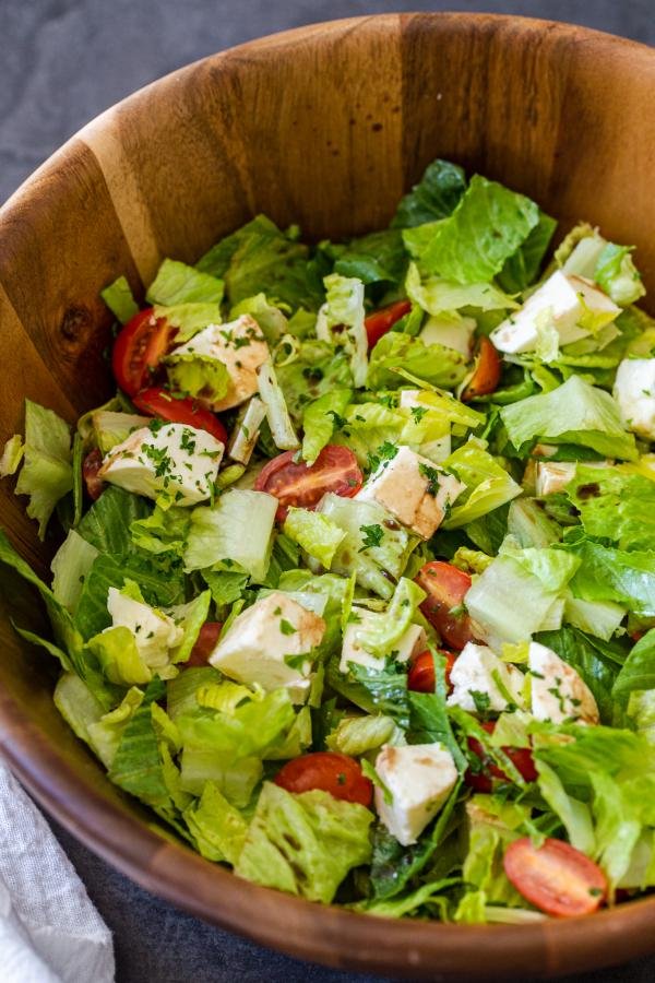 Salad in a wooden bowl