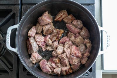 beef browning in a dutch oven