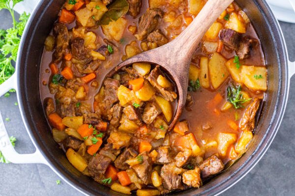 Braised potatoes with beef in a pot