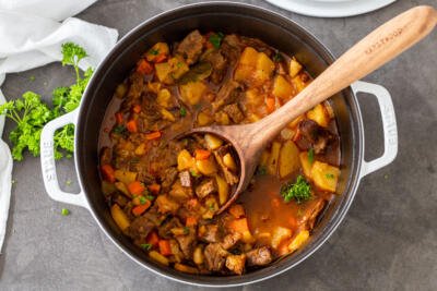 Braised potatoes with beef in a pot