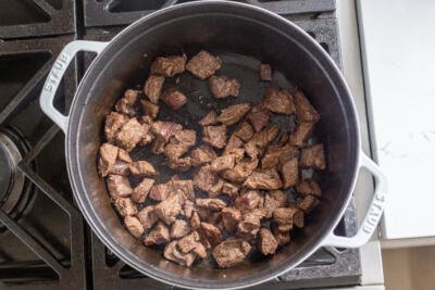 Beef in a pot getting browned