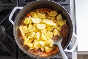 Pot with potatoes and the sauce