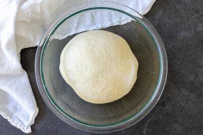 Yeast dough in a bowl for pierogi