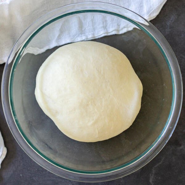 Yeast dough in a bowl for pierogi