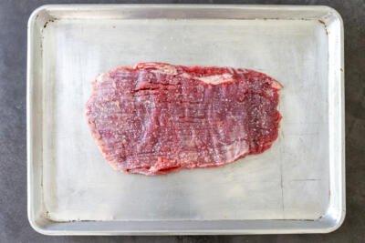 steak on a baking sheet