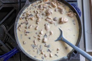 cream and chicken in a skillet