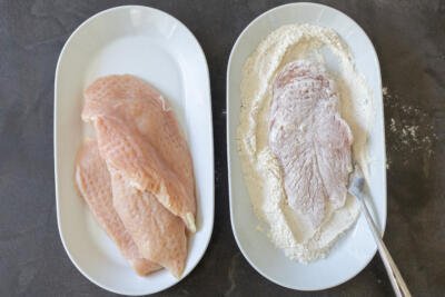 marinated chicken and seasoned flour for coating