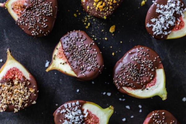 Chocolate covered figs on a counter