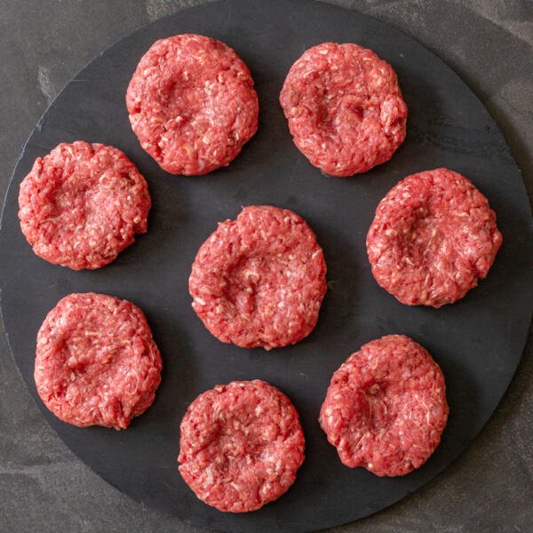 meat sliders patties on a tray