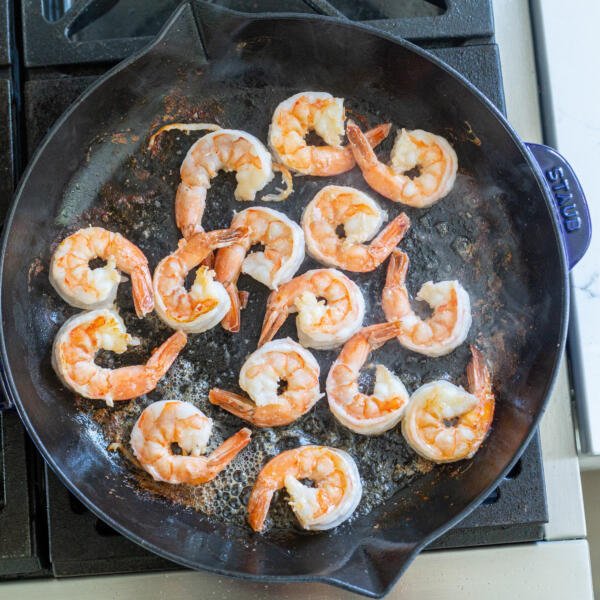 shrimp in a pan frying