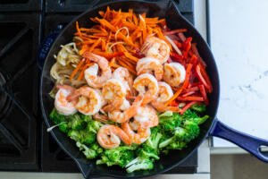 Shrimp with veggies in a pan