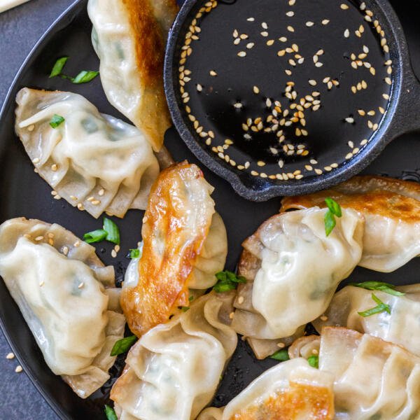 Gyoza on a plate with soy sauce