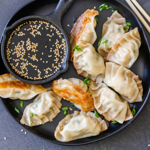 Gyoza on a plate with soy sauce