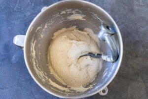 Mixing bowl with dough for honey wheat bread