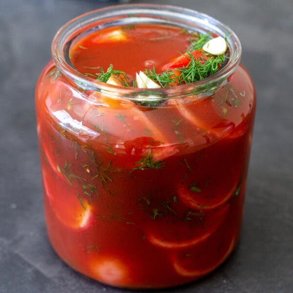Marinated tomatoes in a jar