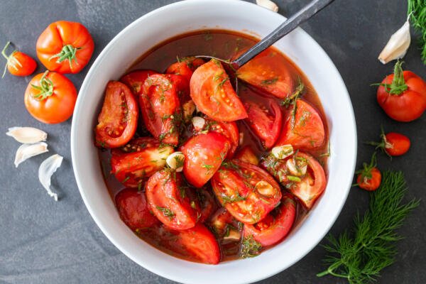 Marinated tomatoes in a bowl