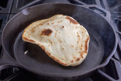Naan on a skillet