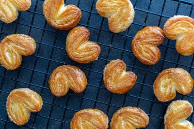 baked palmiers on a cooling rack