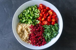 All the ingredients for Quinoa Salad in a bowl
