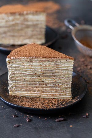 a slice of a Tiramisu Crepe cake