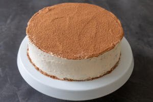 Tiramisu crepe cake on a cake stand