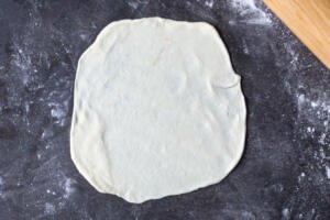 rolled out dough for the tortilla recipe