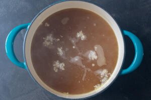 Wonton soup broth in a pot