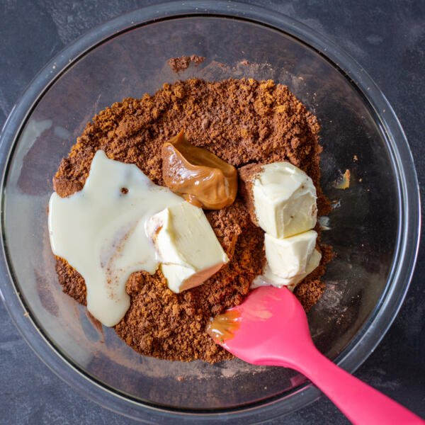 cacao powder, cookies, butter and condensed milk