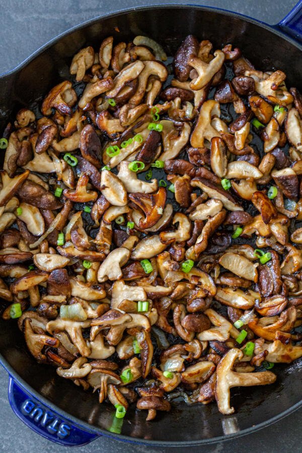 fried shitake mushrooms in a pan