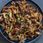 fried shitake mushrooms in a pan