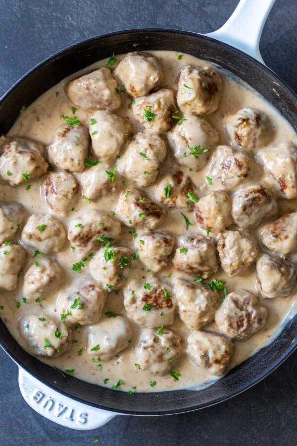 meatballs with gravy in a pan 