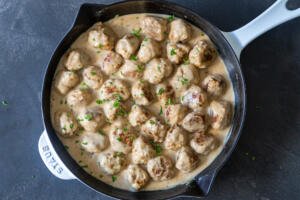 meatballs with gravy in a pan