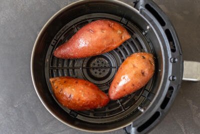 sweet potato in an air fryer basket