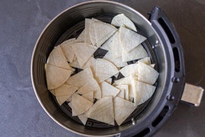 Air fryer basket with tortilla chips