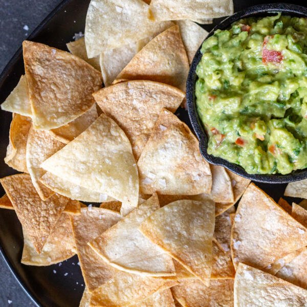 Air fryer tortilla chips and guac on the side
